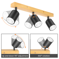 Spot de plafond GU10 moderne et minimaliste en métal noir à 3 têtes avec base en bois rotative, montage en surface, disponible en OEM pour salon et maison