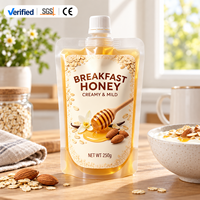 Sachets à bec verseur personnalisés OEM/ODM jetables de qualité alimentaire avec autocollants personnalisables pour l'emballage de miel en détail