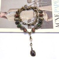 Collier long de style rétro européen américain pour femmes en métal incrusté de pierres précieuses conception transfrontalière en alliage déclaration chaîne de chandail