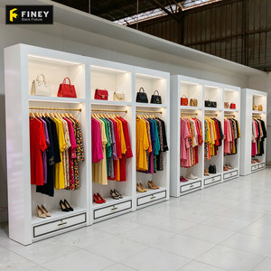 Mobili per Boutique di Moda, Armadi a Muro Personalizzati, Espositori in Legno per Negozi di Abbigliamento - Product Image 1