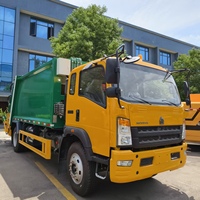 Vente directe d'usine SINOTRUK 4x2 8CBM Camion compacteur de déchets à chargement arrière
