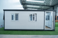 Casa Contenedor Plegable y Expandible de Diseño Nuevo, Blanca, Aislada, Prefabricada, con Baño y Cocina para Uso Residencial
