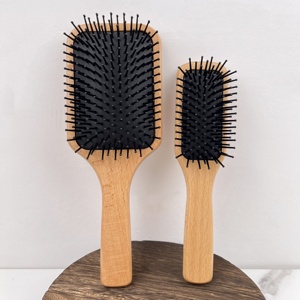 Fabricant de brosses <span class=keywords><strong>à</strong></span> <span class=keywords><strong>cheveux</strong></span> antistatiques <span class=keywords><strong>en</strong></span> <span class=keywords><strong>bois</strong></span> de hêtre <span class=keywords><strong>Brosse</strong></span> démêlante Peigne de massage du cuir chevelu Paddle Air Cushion Styling Tools for Women Men - Product Image 1