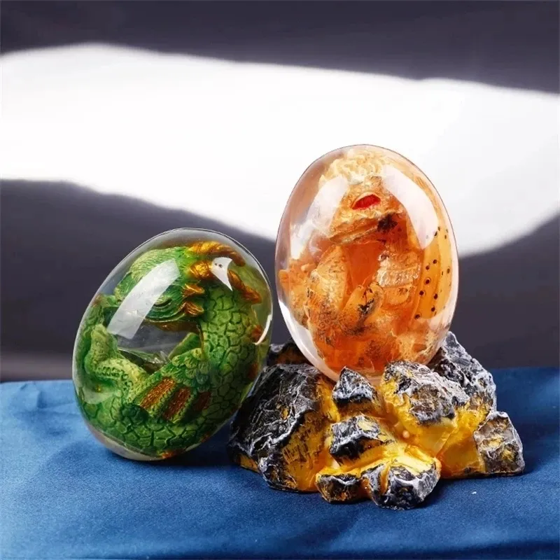 क्रिस्टल पारदर्शी राल प्रतिमा ड्रैगन अंडा स्मारिका राल शिल्प चमकदार हस्तनिर्मित ड्रैगन अंडा घर सजावट उपहार