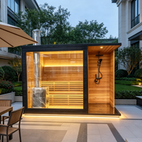 Sauna sec en bois moderne pour l'intérieur et l'extérieur avec douche intégrée et poêle à bois de 6 kW