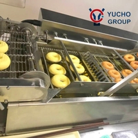 Ligne de production de machines à beignets/donuts entièrement automatiques industrielles Yucho Professional avec acier inoxydable 304 et PLC de marque réputée