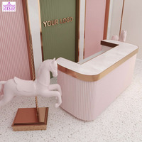 Meilleures ventes Bureau de réception rose adorable personnalisé Comptoir de salon de beauté Petite table de réception Bureau de réception circulaire pour salon de manucure