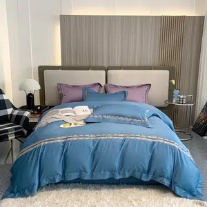 للبيع بالجملة أغطية لحاف فاخرة مطرزة للفنادق المنزلية ملاءات سرير بتصميم أزرق طقم مفارش سرير