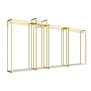 Estante de Metal para exhibir ropa, estantería dorada de alta calidad a la moda - Product Image 1