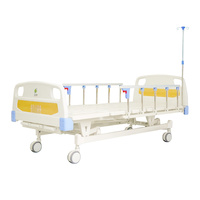 Lit médical manuel robuste avec manivelles en acier inoxydable durables et composants ABS faciles à nettoyer pour les patients
