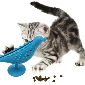 Eco friendly TPE durable bird shaped pet cat chew molar toy leaking food interactive cat scratching bite toy with sucker