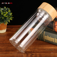 Botol air teh longgar, tutup bambu kaca tahan panas dinding ganda bentuk baru