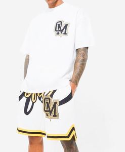 Ensemble de survêtement de sport en coton blanc oversize pour le basketball, comprenant un t-shirt et un short - Product Image 1