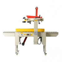 Scelleuse de cartons électrique semi-automatique efficace 18 m/min FXC4030 à entraînement latéral pour usage professionnel alimentaire (Royaume-Uni)