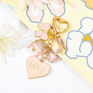 Pretty Heart Charm Keychain Flower Bow Knot Bag Fashion Rose Enamel <b>Key</b> <b>Chains</b> Woman Keychain Gift Cute Keychains for Girls - Product Image 4