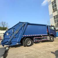 Camion Compacteur à Ordures Bleu Personnalisé HOWO 4X2 RHD avec Transmission Manuelle, Pompe et Moteur, Capacité 14 m³ 10-15 Tonnes