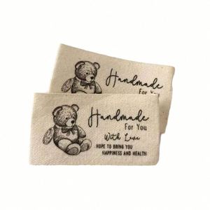 Étiquettes tissées en coton personnalisées en gros, faible MOQ 100 pièces, étiquettes pour vêtements - Product Image 5