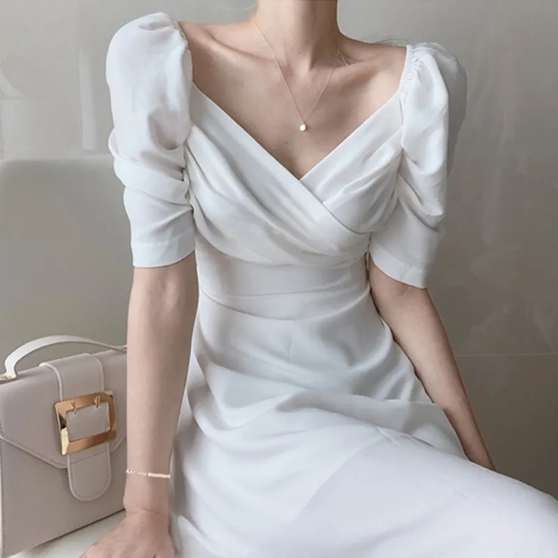 Wholesale 2022 Summer Ins French Temperament V-neck Leaking Collarbone Careful Machine Waist and Slim Puff Sleeve Chiffon Dress