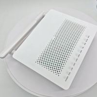 Penjualan Terlaris HG8546M Single Mode 1GE+3FE+TEL+WIFI ONU 2025 Router Serat Optik Baru XPON Peralatan Jaringan FTTH Versi Bahasa Inggris