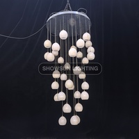 Lustre moderne de luxe créatif en pierre d'albâtre ronde pour salon, restaurant, escalier, décoration de la maison, luminaire suspendu