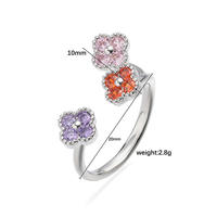 Élégant et luxueux, en cuivre incrusté de zircon coloré, trèfle à quatre feuilles porte-bonheur, pétale de fleur exquis super brillant, cadeau de mariage ouvert