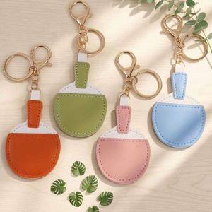 Porte-clés moderne en cuir PU en forme de raquette de ping-pong avec impression en relief, cadeau promotionnel portable pour hommes et femmes - Product Image 3