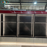 Hochwertige Glas-Handyhüllen-Vitrine für Einzelhandelsgeschäfte Telefonshop-Vitrine mit LED-Beleuchtung und Massivholz-Lamellenwand