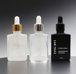 Envase Cosmético al por Mayor, Botella de Vidrio Esmerilado Negro Transparente con Tapa Cuentagotas Dorada de 100 ml, Botella Cuentagotas de Vidrio con Logotipo Personalizado - Product Image 1