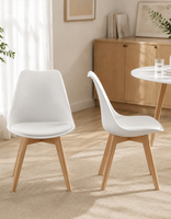 Chaise de salle à manger moderne en plastique PP avec pieds en bois de hêtre et coussin rembourré pour la maison, le bureau et l'hôtel