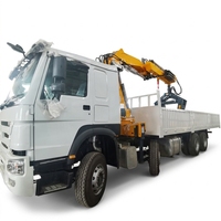 Camion-grue articulé CLW Howo 8x4, moteur FPT, capacité de 16 tonnes, hauteur de levage de 14 m, grappin hydraulique pour bois, bras pliable