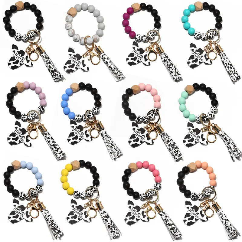 Wholesale Custom Silicone Beads Wooden Beads Key Chain Cow Print Tassell Wood Beaded Wristlet Bracelet Keychain Gift