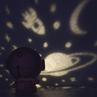 Projecteur de Galaxie Astronaute Décoration de Chambre à Coucher LED Charge USB Veilleuse Rotative Mini Projecteur de Galaxie Astronaute avec Musique