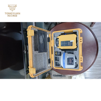 Récepteur GNSS RTK portable à 1408 canaux avec corps en alliage de magnésium et fonction de relevé d'inclinaison IMU pour projets de cartographie topographique terrestre