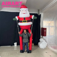 Marionnette gonflable personnalisée du Père Noël pour la décoration extérieure de Noël Couleurs et logo personnalisés disponibles