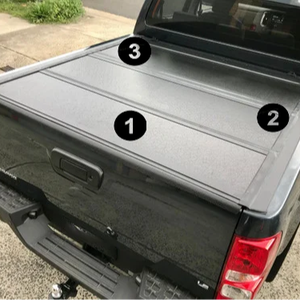Cubierta dura de tres pliegues Hilux Tonneau, cubierta de cama de camión, accesorios de aluminio para automóviles para <span class=keywords><strong>Nissan</strong></span> Navara NP300 <span class=keywords><strong>Nissan</strong></span> <span class=keywords><strong>Frontier</strong></span> - Product Image 1