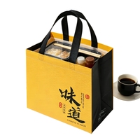 Sac en tissu non tissé imprimé en stock avec poignée, idéal pour l'emballage de plats à emporter en restaurant