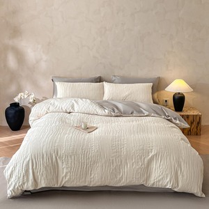 Ensemble de literie quatre pièces en jacquard 100% coton comprenant drap, taies d'oreiller, housse de couette - Product Image 1
