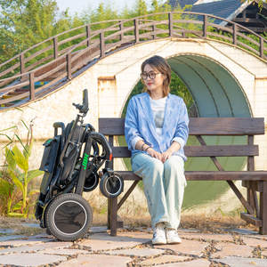 Silla de ruedas eléctrica de fibra de carbono para viajes Silla de ruedas eléctrica resistente de largo alcance - Product Image 2