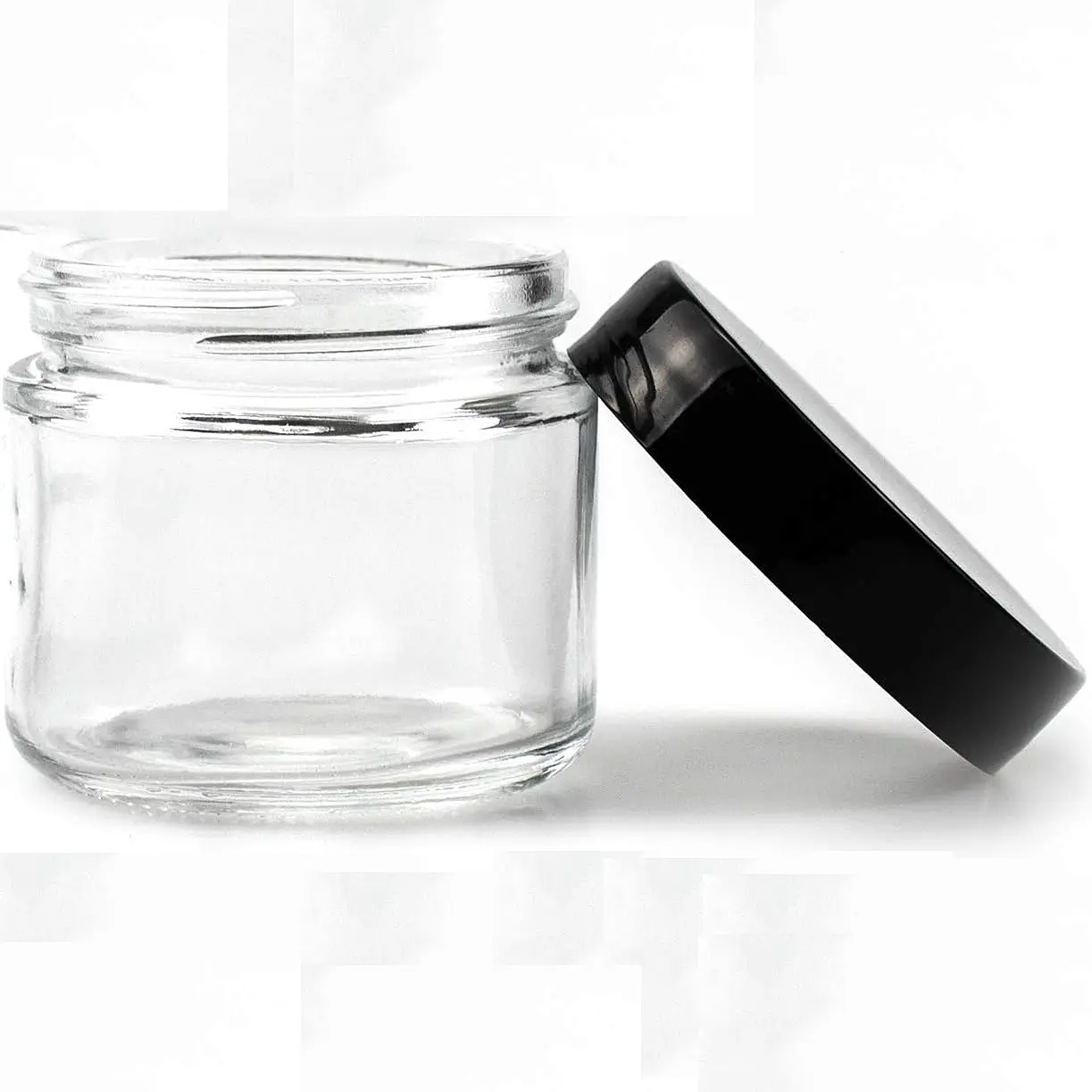 Tarro redondo de 2oz Frascos de vidrio transparente de lado recto Frasco de vidrio hermético con tapas lisas de plástico negro