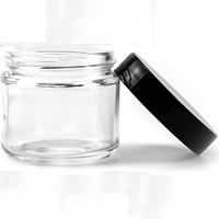 Pot rond de 2oz Bocaux en verre transparent à flanc droit Bocal en verre hermétique avec couvercles lisses en plastique noir