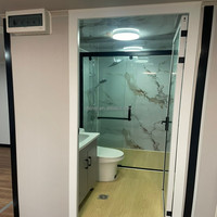 Maison mobile préfabriquée standard AU avec salle de bain complète, panneaux métalliques embossés, maison modulaire portable pour usage hôtelier et d'appartement