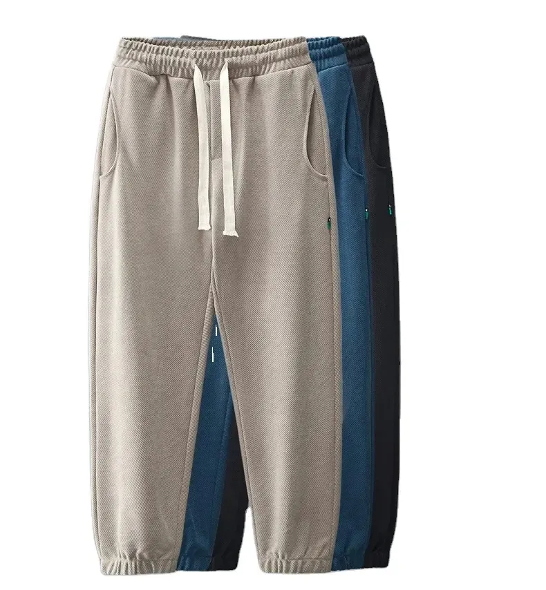 Pantaloni della tuta di cotone spesso ad alta quantità da uomo pantaloni da jogging personalizzati in pile pesante con ricamo