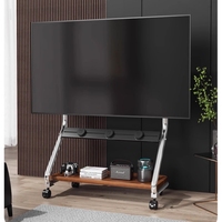 Chariot rotatif réglable en acier inoxydable pour téléviseur au sol Support pour téléviseur à DEL avec prise de courant et panneau perforé