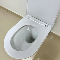 Cuvette de toilette moderne en céramique monobloc sans rebord pour la maison, réservoir dissimulé, WC suspendu, toilette pour villa, salle de bain