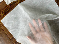 Protège-maquillage jetable en non-tissé doux à usage unique pour cabine d'essayage, protection anti-taches de vêtements et cheveux
