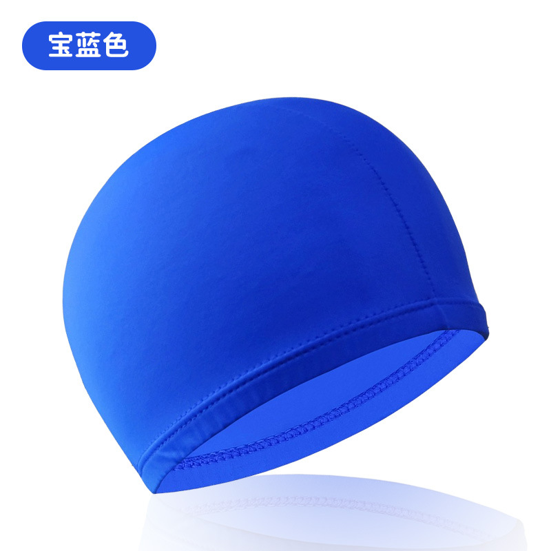 Azul real, muy elástico y cómodo, no impermeable.