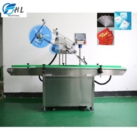 Applicateur automatique d'étiquettes de machine d'étiquetage d'étiquettes volantes Rfid en tissu de vêtement avec chargeur automatique