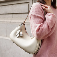 Sac à main en cuir véritable avec fermeture éclair, sac croissant en polyester à porter sous le bras, design simple et original, couleur bonbon, sac portable pour femme