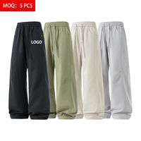 Pantalon d'été tissé pour homme en polyester, perforé au laser, anti-plis, séchage rapide, respirant, léger, personnalisable avec logo – Marque privée