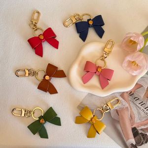 Handcrafted PU Leather Bow Keychain Purse <b>Charm</b> Bowknot Keychain Creative <b>Keyring</b> Key Holder Bag Pendant Valentines Party Favor - Product Image 1